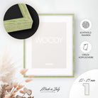 DÖRR Echtholz-Bilderrahmen Woody grün, dekorativ an der Wand aufgehängt, mit Detailansicht der 12 x 19 mm schmalen Leiste